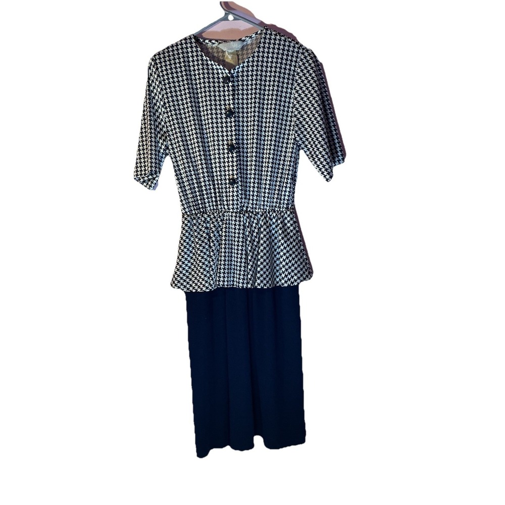 vintage peplum dress featuring a classic black and white houndstooth